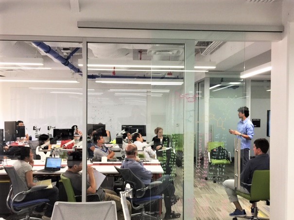 staff listening to lecture in new bioinformatics department facility