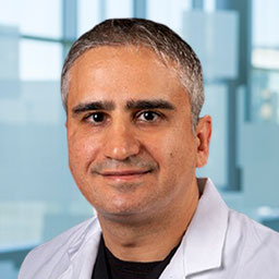 Dr. Mani Alavi