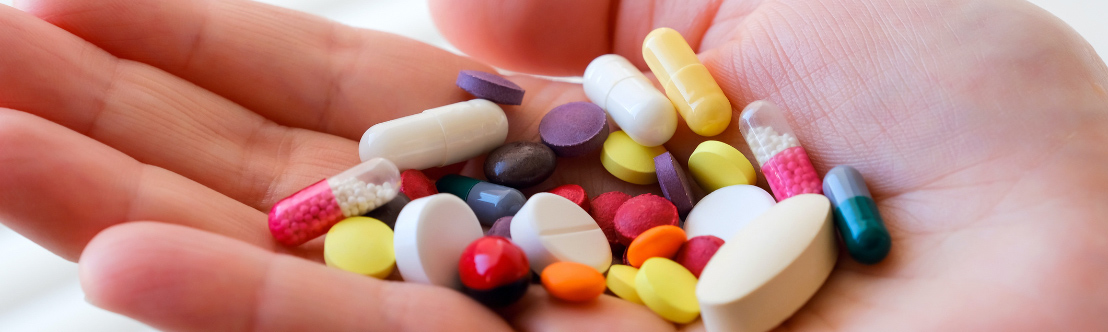 Handful of colorful pills