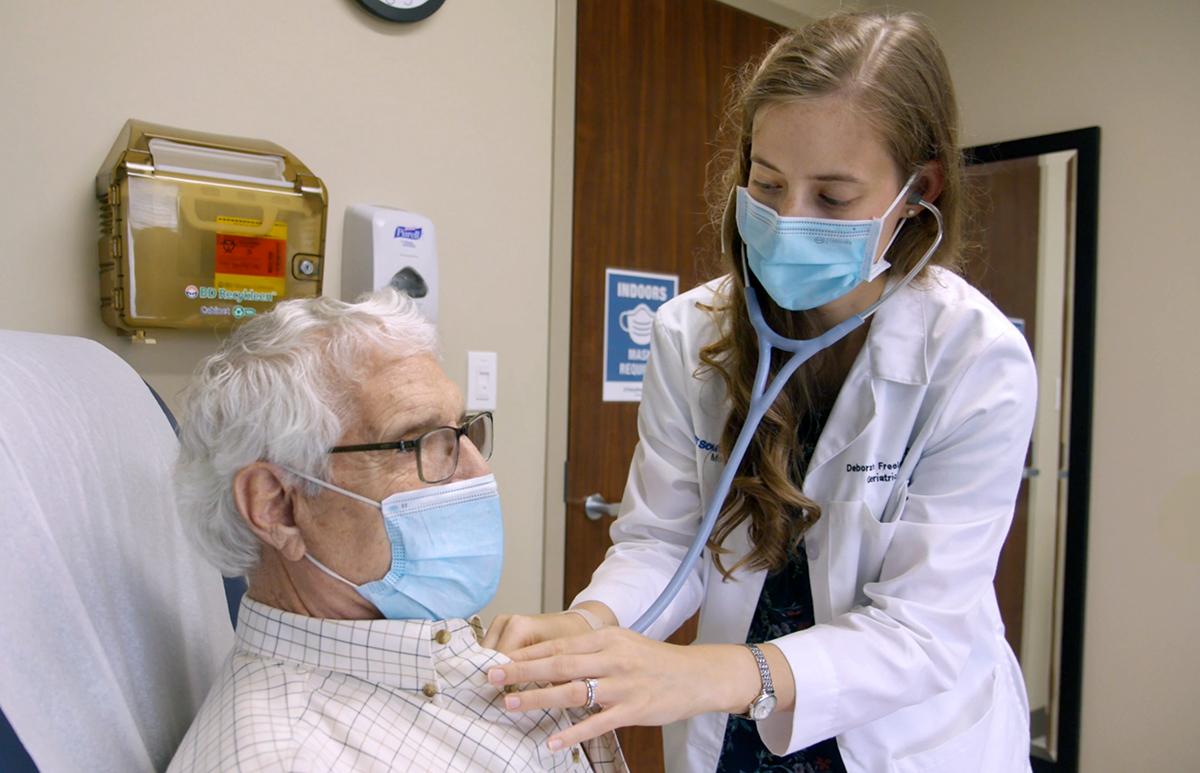 Dr. Deborah Freeland exams a geriatric patient