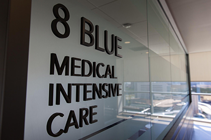 hospital hallway with a MICU sign