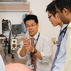 Residents during a simulation session with Won Lee, M.D.