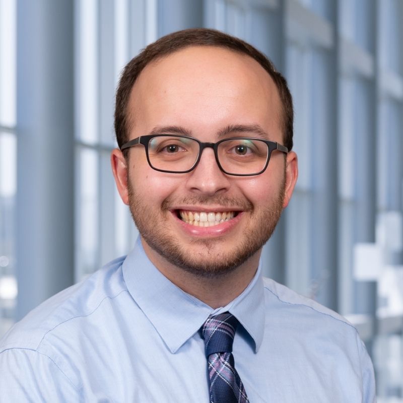 Headshot of Dr. Alec Mason