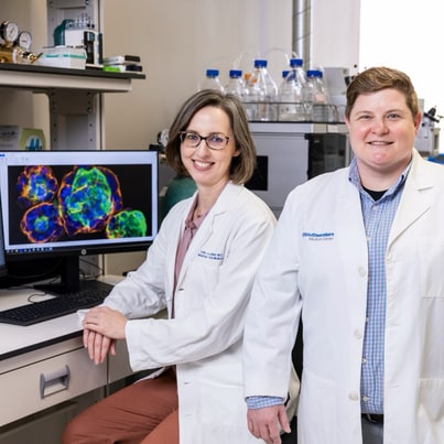 Two UT Southwestern Ob/Gyn clinical faculty in the lab