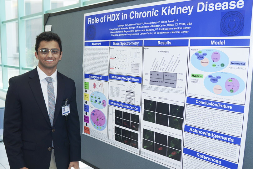 A SURISKD student with his poster A student stands by his poster that is titled Role of HDX in Chronic Kidney Disease