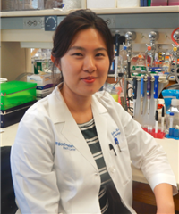 Soo Young (Esther) Kim Veleka Iwuaba in lab