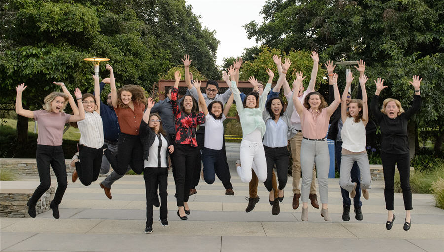 Amgen Scholars jumping in the air