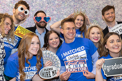 Students enjoy the Match Day photo booth
