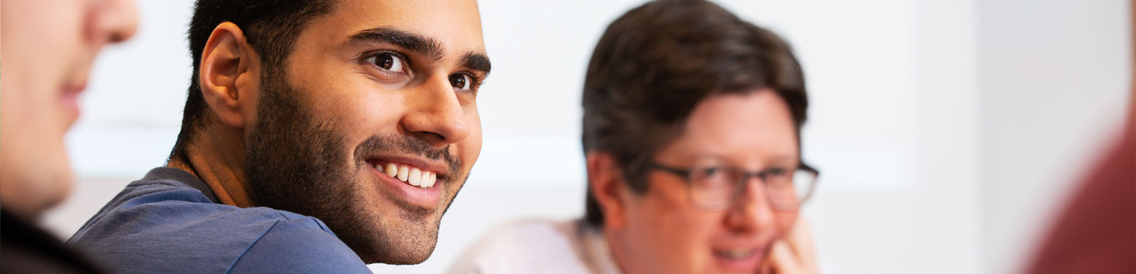 Student sitting with a professor