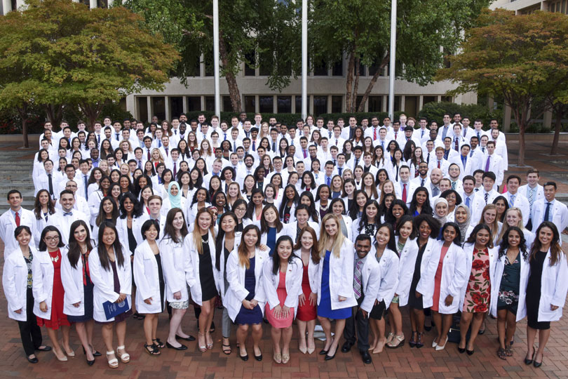 Medical School class in their white coats. Medical School class in white coats