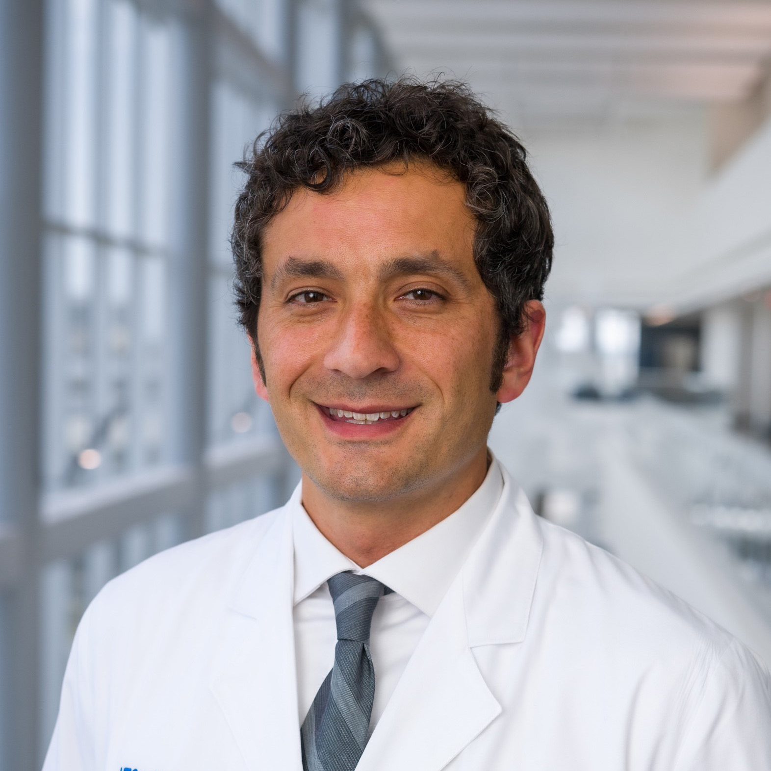 Asher Weisberg, M.D.