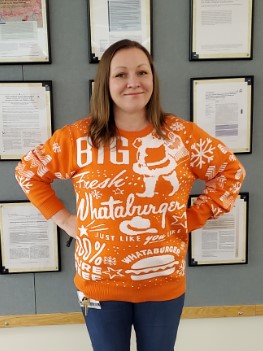 Woman in orange sweater