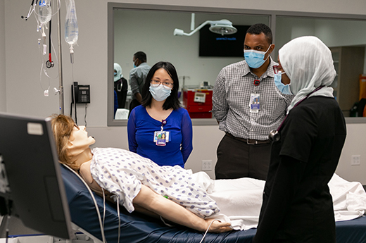 residents work with mannikin