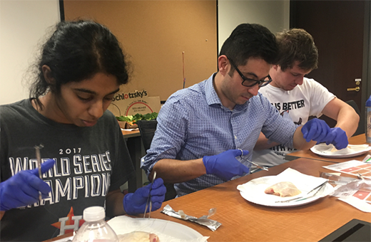 residents practice suturing