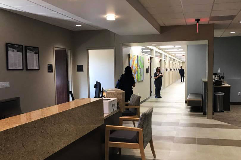 The front desk and entry hall of a family medicine clinic