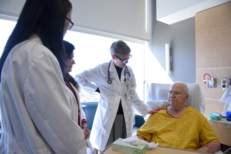 image of Dr. Wingfield with geriatric hospital patient