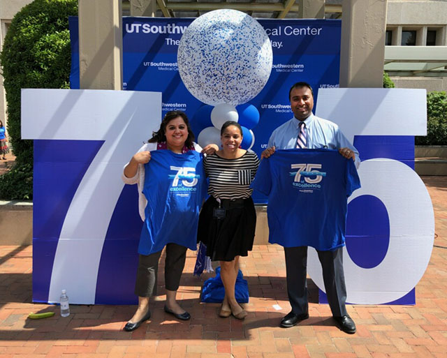 Drs. Julie Trivedi, Carolee Estelle, and Reuben Arasaratnam celebrating UT Southwestern's 75th anniversary