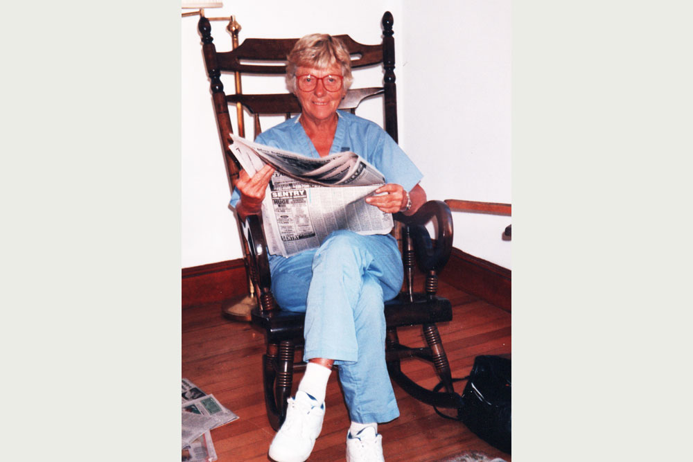 Dr. Peggy Whalley relaxes in a rocking chair