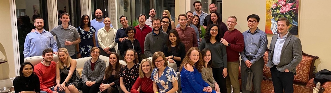 Pathology Residents and Fellowship holding up welcome sign