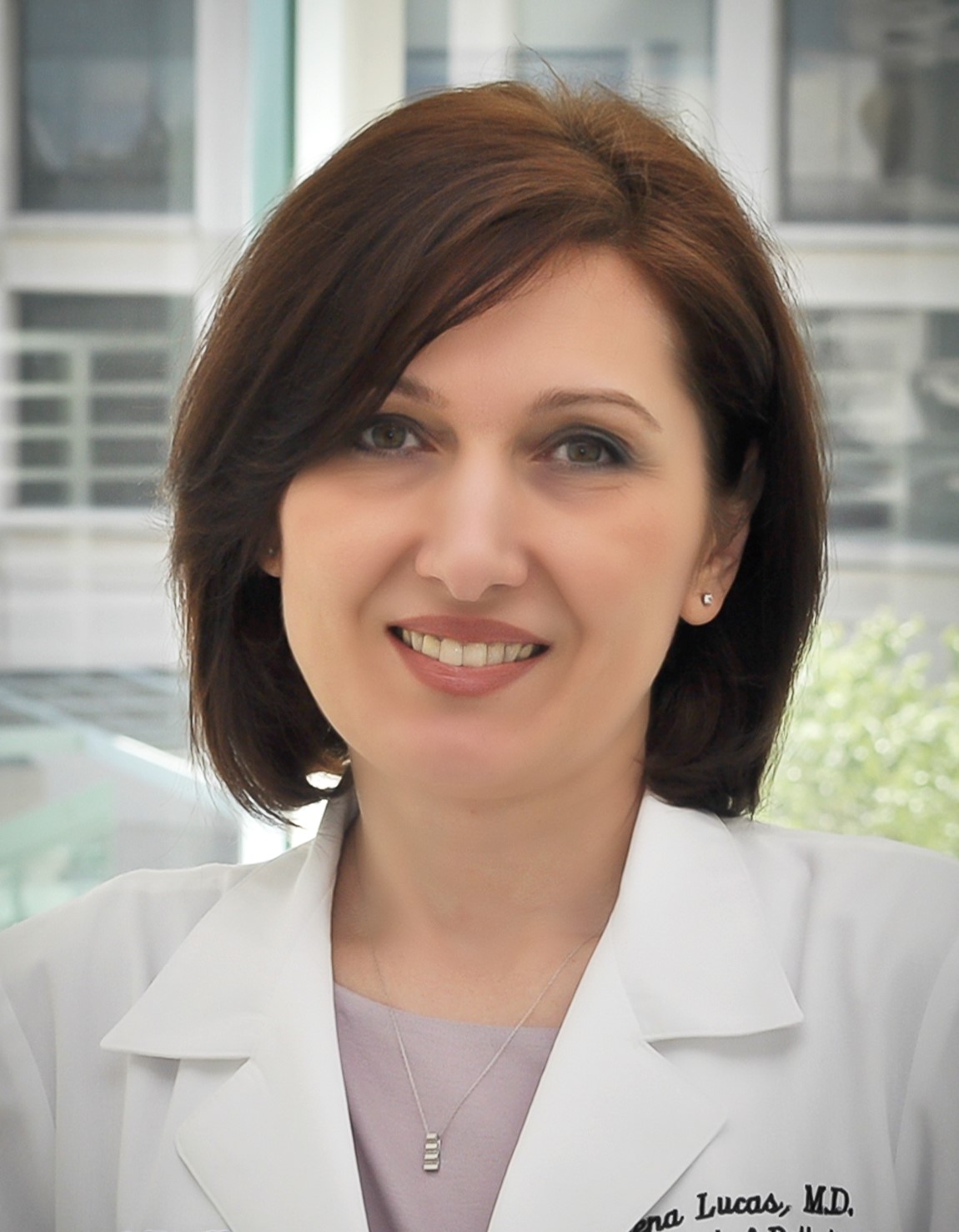 Dr. Elena Lucas