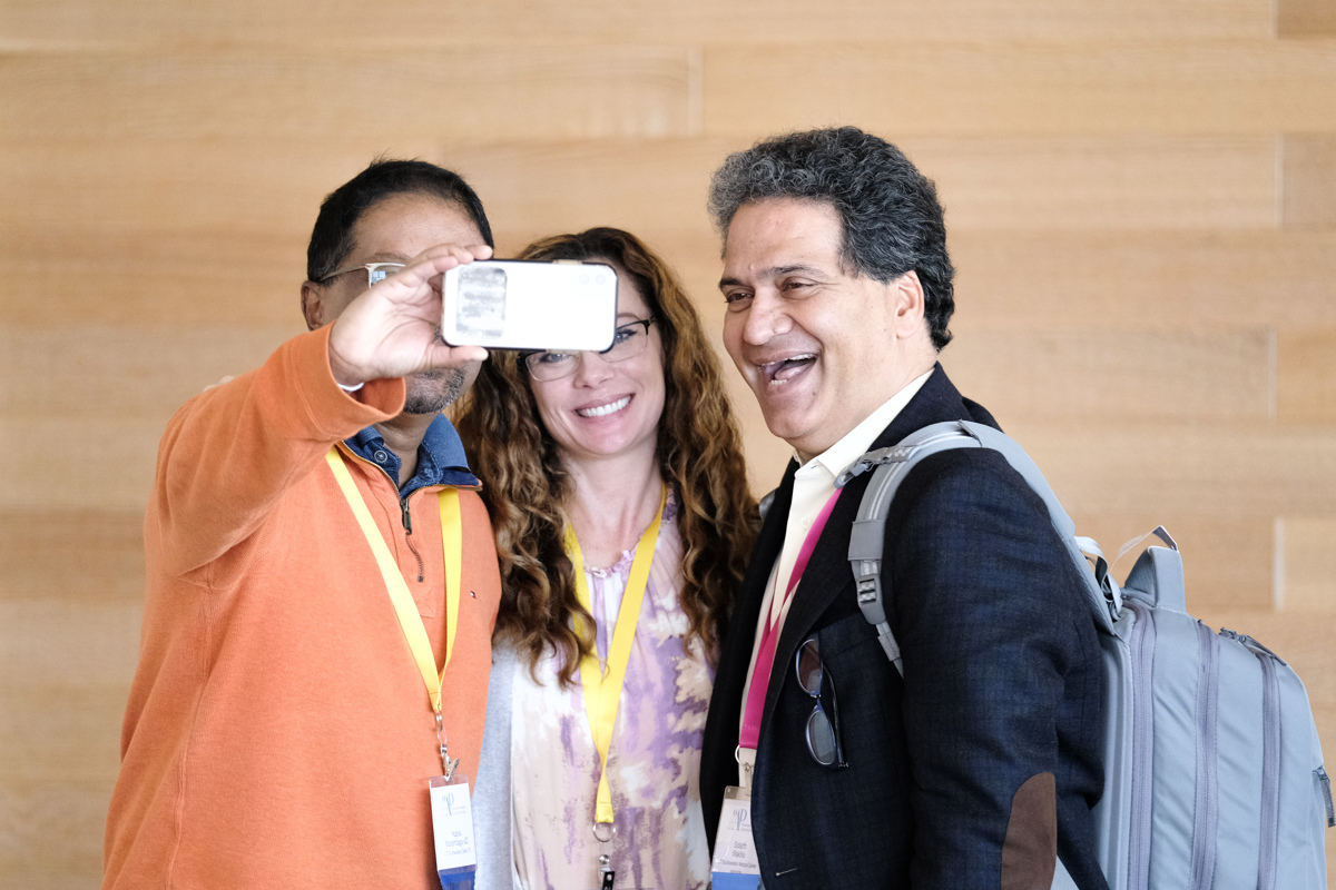 Drs. Marambage, Marnell, Wakhlu connecting at a conference