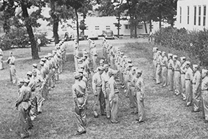 Inspection of Senior Platoons Soldiers in line with inspectors walking among them