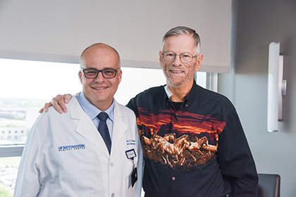 Carlos Timaran, M.D., with patient James Isbon