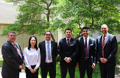 The 20th Annual Research Forum winners (from left to right): Surgery Chair Herbert J. Zeh, III, M.D., with best poster winner Wenting Du, best oral presentation winners Ali El Mokdad, M.D., and Epameinondas Dogeas, M.D., best poster winner Tarik Madni, M.D., and keynote speaker Brian Zuckerbraun, M.D. The 2018 annual research forum winners
