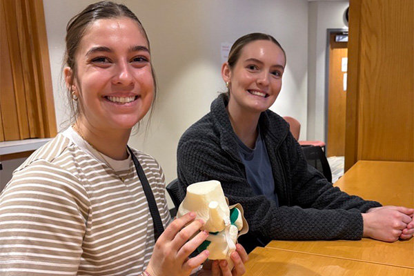 Two female STARS students smiling