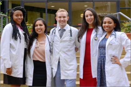 A group of medical students smiling at the SACNAS
