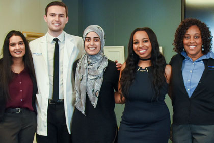 Group photo of man, women of diverse races and religions