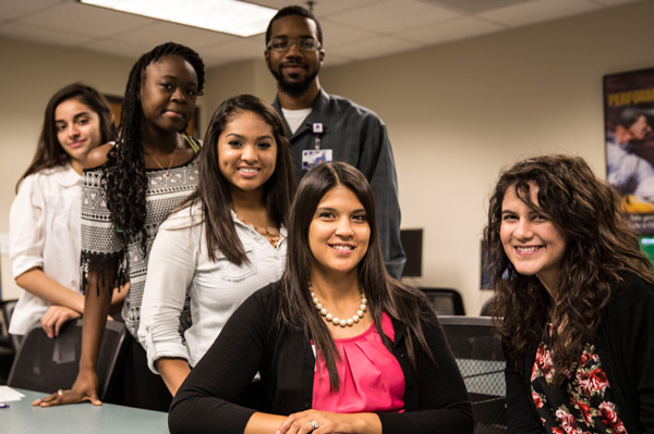 Six young male and female participants of the Dr. Emmett J. Conrad Leadership Program