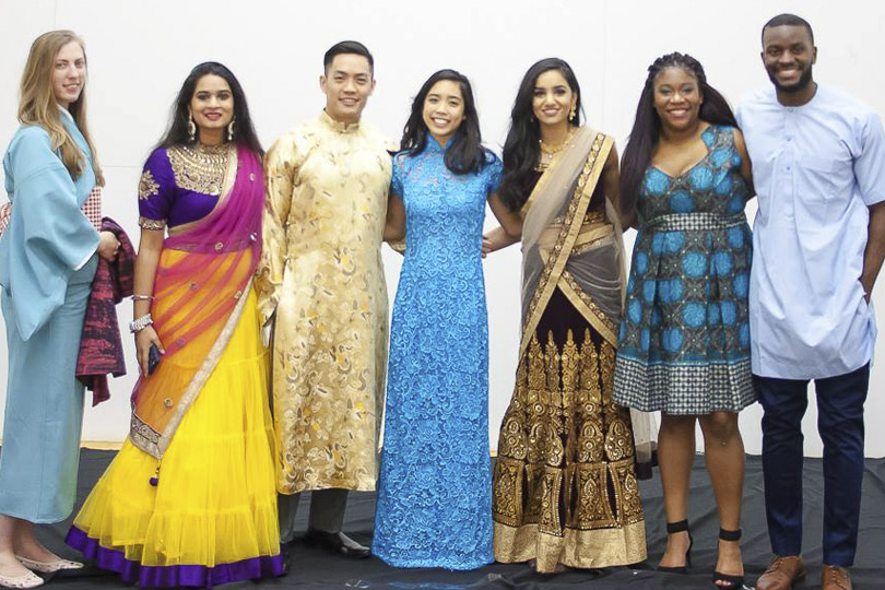 Students dress in traditional cultural attire.