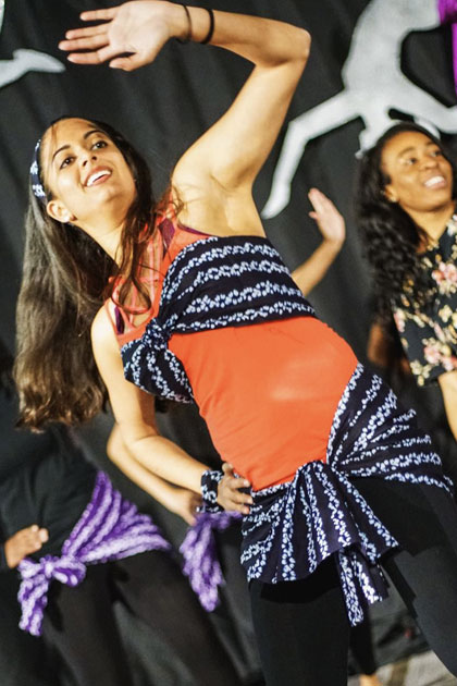 Two students perform an Indian dance.