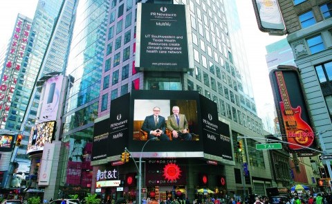 Times Square billboard with Podolsky and Berdan