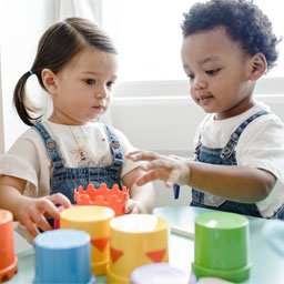 Two toddlers playing together