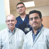 (Left to right) Dr. Edward Wakeland, assisted by computational biologist Carlos Arana and Dr. Prithvi Raj, leads a new DNA sequencing initiative at UT Southwestern.