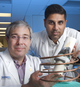 Dr. David Greenberg, left, and Dr. Rajiv Chopra have shown that a coil magnet wrapped around a prosthetic knee can destroy bacterial biofilm on the artificial knee.