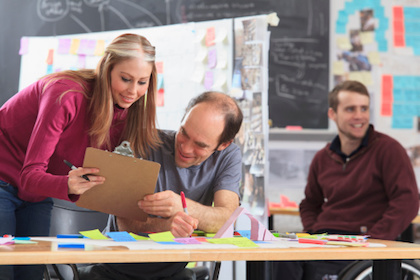 Decorative photo of teacher working with student