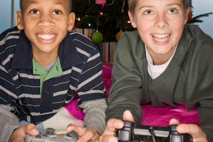 Decorative photo of children playing video games