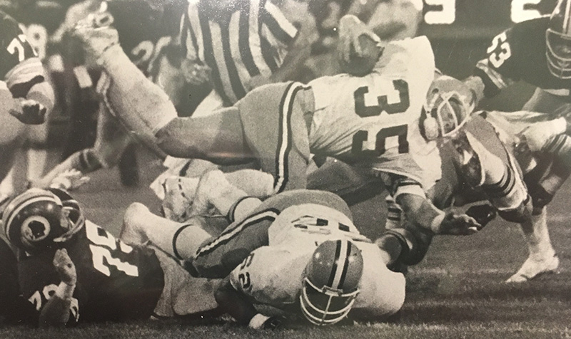 Brian Duncan played for the Cleveland Browns in 1976 and 1977. He is among more than 70 retired NFL players helping UT Southwestern research the long-term effects of concussions. Duncan playing with the Browns
