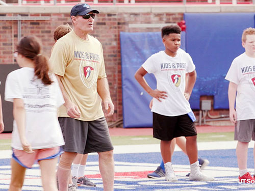 Duncan coaching youth football