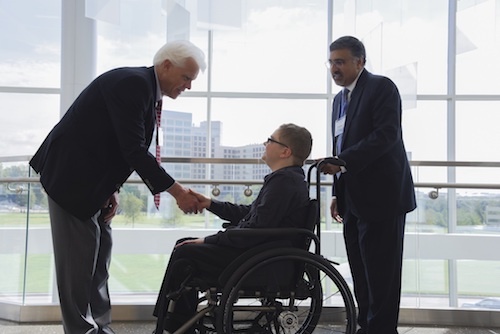 Ben Dupree is introduced to Dr. Eric Olson, left, by Mr. Dupree’s cardiologist, Dr. Pradeep Mammen, right. Dr. Olson recalls, “From the first time I met Ben, I felt we had a real connection.