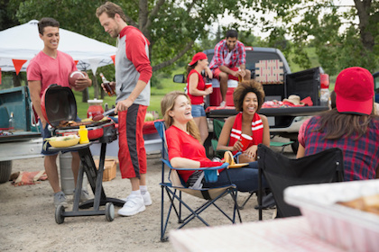 Friends at tailgate party