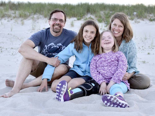 The Duff family started a foundation to raise money for medical research after Talia was diagnosed with CMT4J. From left: father John, sister Teaghan, Talia, mother Jocelyn.