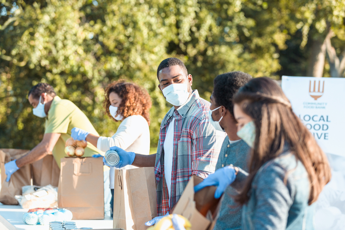 A group of people serving at food pantry.