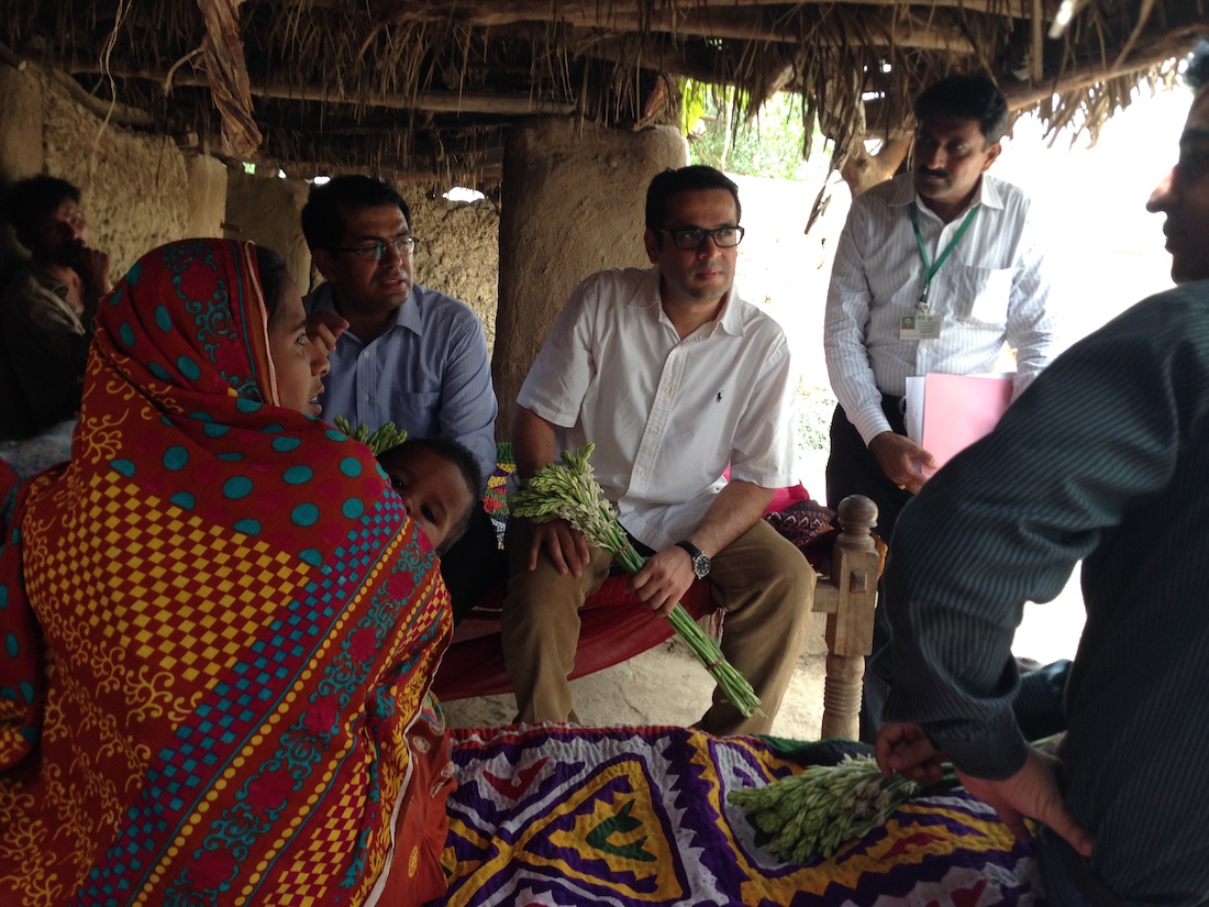 Dr. Omer, shown conducting fieldwork in Pakistan