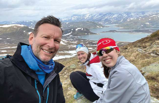 Trond Bergestuen, Ph.D., and his daughters in the mountains of Norway