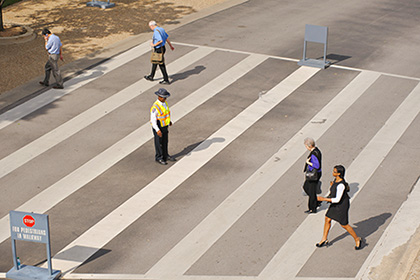 How did the traveler cross the road? Safely! Check out these crosswalk safety tips from University Police