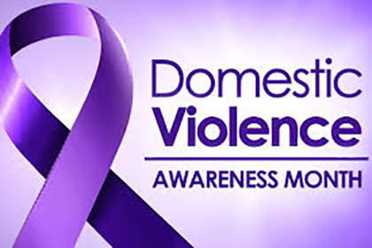 Domestic Violence Awareness Month with a purple ribbon